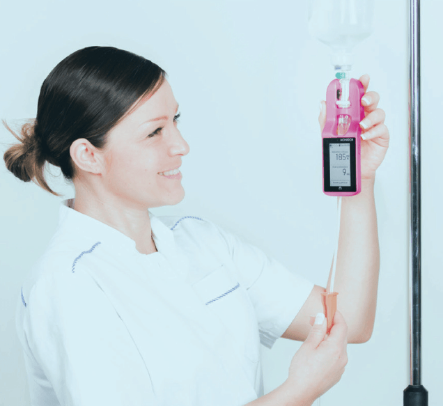 nurse using monidrop iv infusion monitor