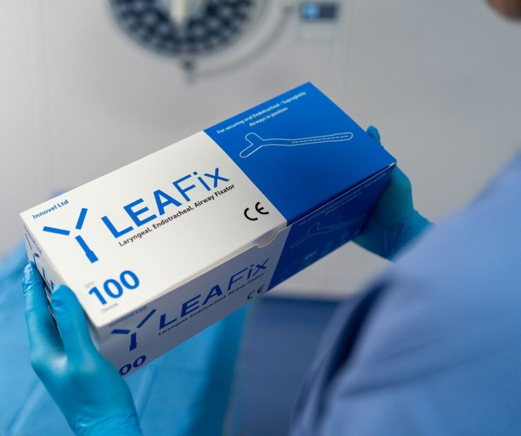 Holding Leafix box in theaytre edited